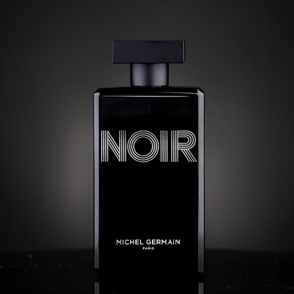 Elegant glow highlights the design of Noire Eau De Cologne Paris