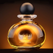 Load image into Gallery viewer, Sexual Pour Homme parfum bottle shown with soft ambient glow