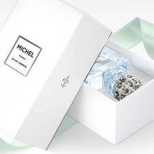 Load image into Gallery viewer, French perfume lavender bottle displayed with ribbon-wrapped carton