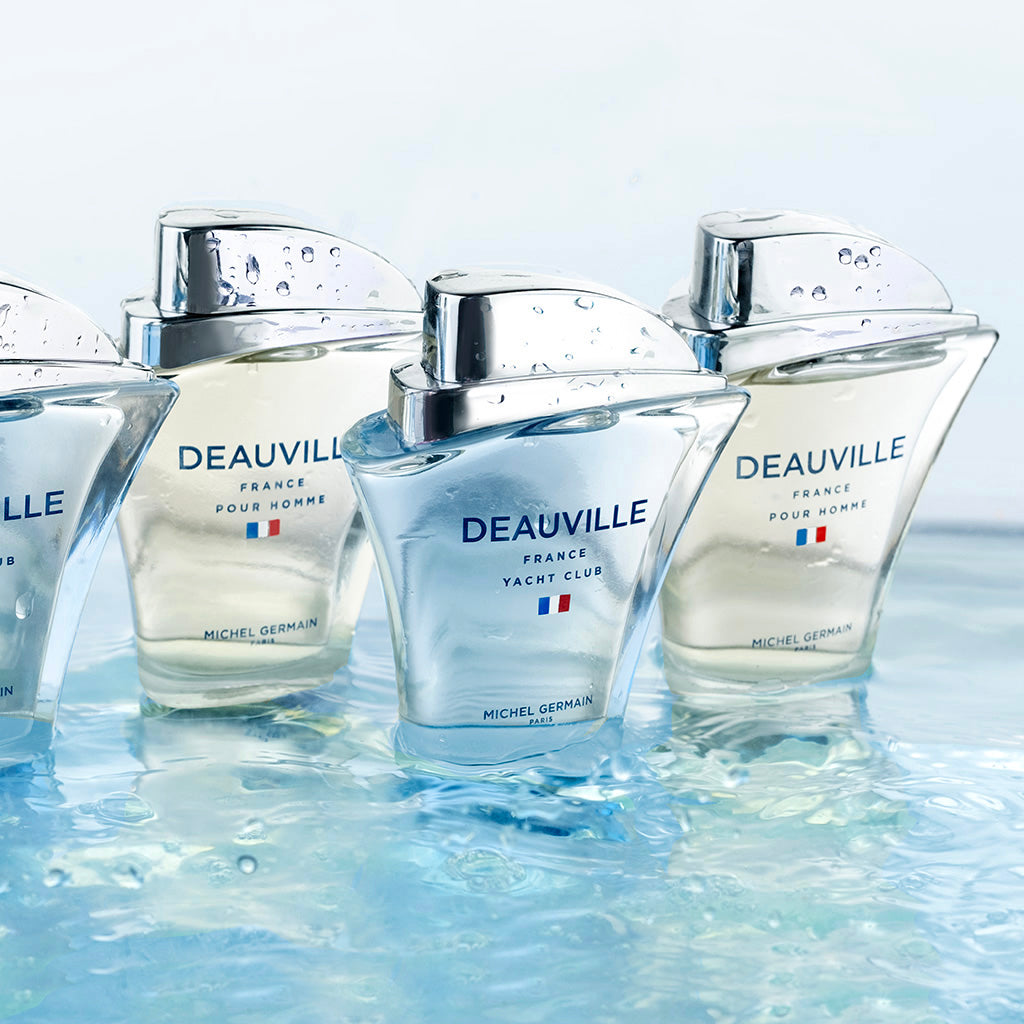 Deauville Michel Germain Yacht Club cologne collection bottles on water surface