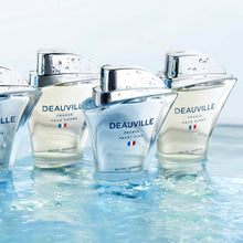 Load image into Gallery viewer, Deauville Michel Germain Yacht Club cologne collection bottles on water surface
