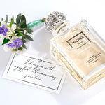Michel Germain orange blossom and vanilla perfume with love note and flowers