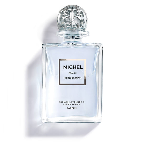 Glass bottle of French lavender perfume with elegant shadow styling