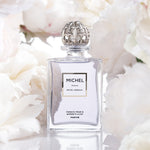 Michel Germain lilac cologne displayed with blooming peonies
