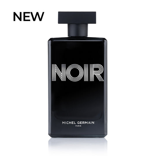 Straight-on view of Michel Germain’s Noir Pour Homme cologne bottle