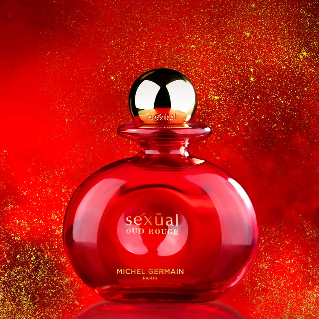 Bold red Sexual Oud Rouge perfume bottle on glittering background for Rouge Sex