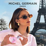 Woman with Sexual Paris perfume by Michel Germain at Eiffel Tower - iconic Paris perfume