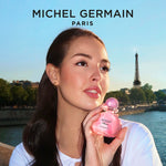 Woman applying Sexual Paris perfume by Michel Germain at Seine River - Paris perfume lifestyle