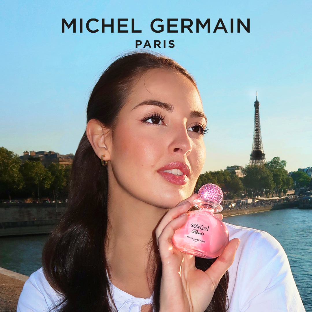 Woman applying Sexual Paris perfume by Michel Germain at Seine River - Paris perfume lifestyle