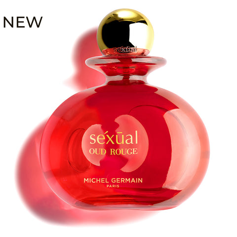 Red glass bottle of Sexual Oud Rouge perfume by Michel Germain, a bold sexual fragrance