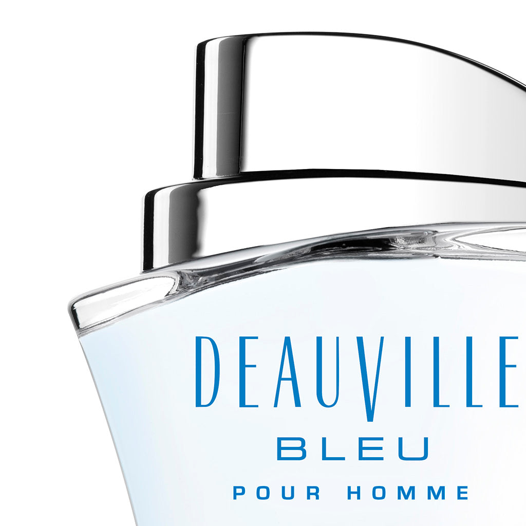  Close-up of Deauville Bleu Pour Homme by Michel Germain – blue cologne for men with sleek silver cap and modern glass design